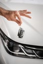 close up hand holding car keys. High quality photo Royalty Free Stock Photo