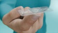 Close-Up of a Hand Holding a Hi Tech Vaccination Patch. Transdermal Vaccination: A Futuristic Method Using a Transparent