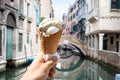 Hand Holding Ice-cream Cone On Street Royalty Free Stock Photo