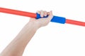 Close up of a hand holding a javelin Royalty Free Stock Photo