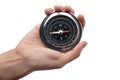 Close up of hand holding magnetic silver metal compass Royalty Free Stock Photo
