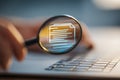 Close-up of a hand holding a magnifying glass over a digital notebook icon projected on a holographic screen, emphasizing document Royalty Free Stock Photo