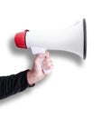 Hand holding megaphone or bullhorn with shadow isolated on white Royalty Free Stock Photo