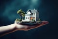 Close up of hand holding model house for represent to client, business idea concept, financial money management, building