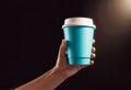 Close-up of a hand holding a paper cup with coffee, mockup illustration for design, Royalty Free Stock Photo