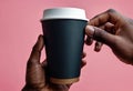 Close-up of a hand holding a paper cup with coffee, mockup illustration for design, Royalty Free Stock Photo