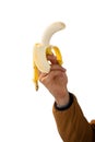 Close-up of hand holding peeled banana Royalty Free Stock Photo