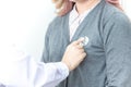 Close Up hand holding Stethoscope doctor. Doctor examining a woman in a hospital. Check up for Coronavirus. Royalty Free Stock Photo