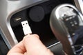 Close Up Of Hand Holding USB Connector In Car Royalty Free Stock Photo