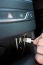 Close Up Of Hand Holding USB Connector In Car Royalty Free Stock Photo