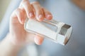 Close up of hand holding white salt cellar Royalty Free Stock Photo