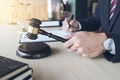 Close up of hand, Judge hitting gavel and scales of justice, Boo Royalty Free Stock Photo