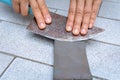 close up hand with Knife sharpener on rock Royalty Free Stock Photo