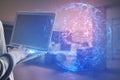 Close up of hand with laptop and abstract glowing polygonal sphere on blurry office interior background. Technology and cyber