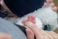 Close up of the hand of little baby holding mothers hand with his little fingers Royalty Free Stock Photo