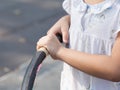 Close up hand of little girls and hula hoop exercise out door