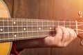 Close up finger Little Girl playing ukulele. Royalty Free Stock Photo