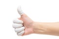 Close up of hand makes thumb up gesture in white natural rubber latex fingertip gloves isolated on white with clipping path