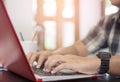 Close up of hand of male at finger typing keyboard of laptop of Royalty Free Stock Photo