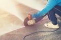 Close up hand man cutting concrete floor with machine Royalty Free Stock Photo