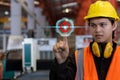 Close up hand man engineer with finger pressing power button of Industrial factory. push click light off electricity. safety Royalty Free Stock Photo