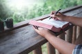 Close up hand of man learning a holy bible. christian concept