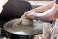 close up hand man making craft pottery ceramic