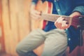 Close up hand man playing acoustic guitar Royalty Free Stock Photo