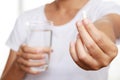 Close up hand man taking multiple pills Royalty Free Stock Photo