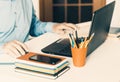 Close-up of hand man using a mouse and typing on laptop on white table, business concept Royalty Free Stock Photo