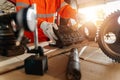 Close up hand of A mechanic man Small Excavator Repair and Maintenance. Heavy Equipment Mechanic Trying to Find an Issue. Royalty Free Stock Photo