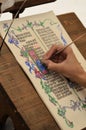 Close-up of hand of medieval manuscript scribe - calligraphy