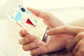 Close up of hand with navigator map on smartphone Royalty Free Stock Photo
