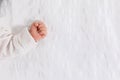 Close up hand of newborn baby Make a fist on white bed.Infant baby showing hand on white background and copy space.Baby Newborn Royalty Free Stock Photo