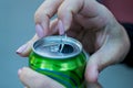 Close up of a hand opening a beverage Royalty Free Stock Photo