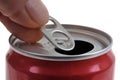 Close-up of a hand opening a beverage can with a tin lid Royalty Free Stock Photo
