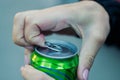 Close up of a hand opening a beverage Royalty Free Stock Photo