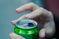 Close up of a hand opening a beverage Royalty Free Stock Photo