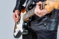 Close up hand playing guitar. Musician playing guitar, live music. Musical instrument. Electric guitar. Repetition of Royalty Free Stock Photo