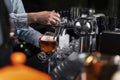 close up hand pouring beer glass. High quality beautiful photo concept Royalty Free Stock Photo