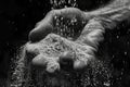 Close-up of a hand pouring sand through fingers symbolizing time Royalty Free Stock Photo