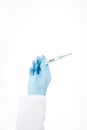 Close up hand in rubber latex medicine blue glove holding a electronic thermometer. Concept heat, malaise, fever, pain