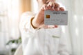 Close up hand showing credit card. Businessman is holding credit card Royalty Free Stock Photo