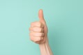 Close up of hand showing thumbs up sign Royalty Free Stock Photo