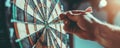 Close up of a hand skillfully throwing a dart towards a dartboard capturing the concentration and precision needed to hit the Royalty Free Stock Photo