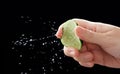 Close up of hand squeezing lemon Royalty Free Stock Photo