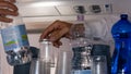 Close up of Hand of a Steward that takes a Plastic Cup during Beverage Distribution on a Flight