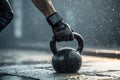 close-up hand on strong grip on kettlebell in rainy workout setting - generated by ai Royalty Free Stock Photo