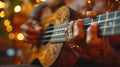 Close-up of a hand strumming a ukulele showcasing music