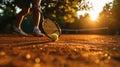 close up of hand with tennis racket and tennisball on green summer grass field